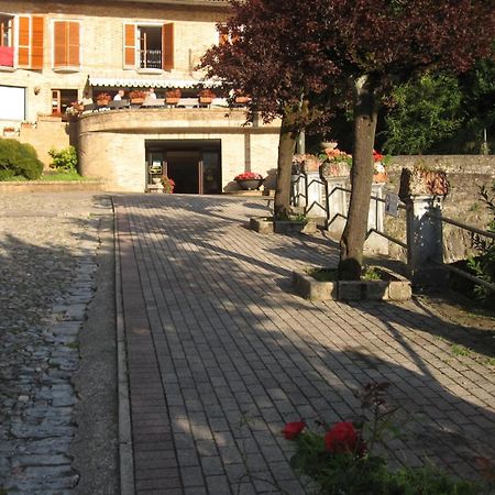 Hotel Ristorante Vapore Faggeto Lario Exterior foto